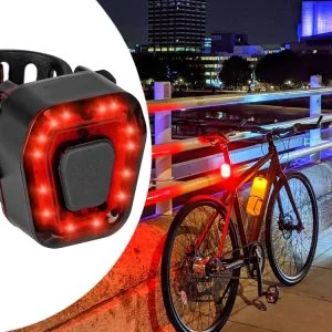 {
"alt_text": "Rdeča 14 LED zadnja kolesarska svetilka na USB polnjenje"
}