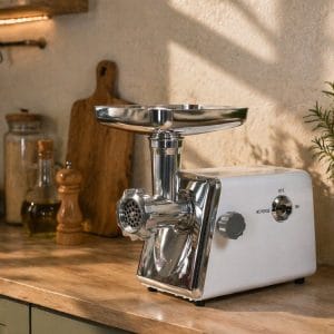 Electric meat grinder with sausage attachments