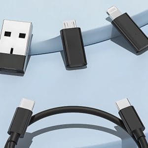 Komplet adapterjev 5v1 USB-C mikro USB Lightning za mobilne telefone 9 Črn komplet adapterjev in polnilnih kablov v okroglem plastičnem etuiju