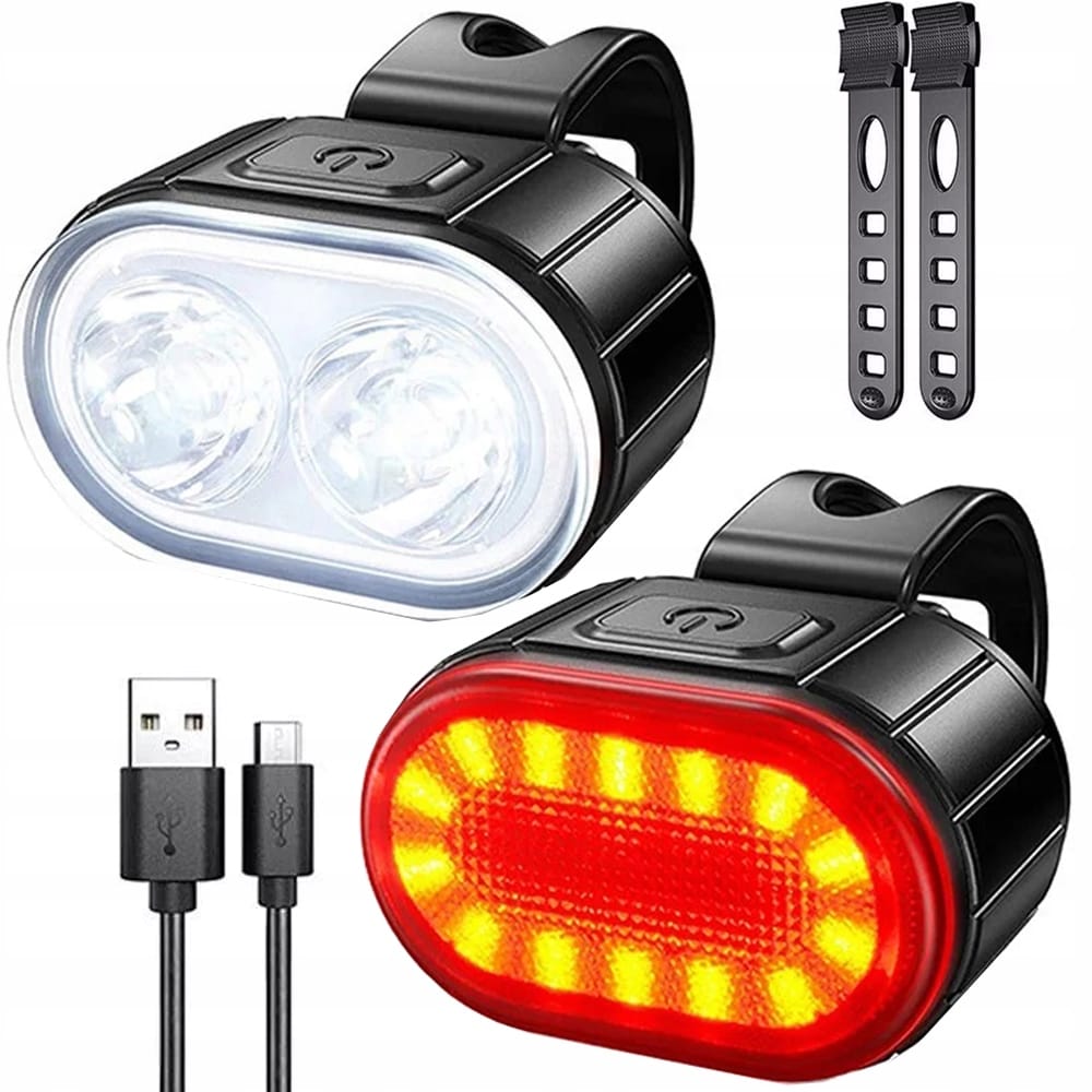 Set močnih aku. LED kolesarskih svetilk USB vodoodpornih črnih 1 Črni kolesarski LED svetilki s polnilnim kablom USB na beli podlagi